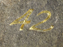 Carved number with glod leaf