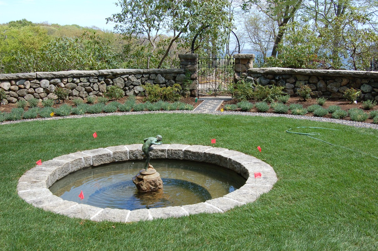Concrete pond with granite coping