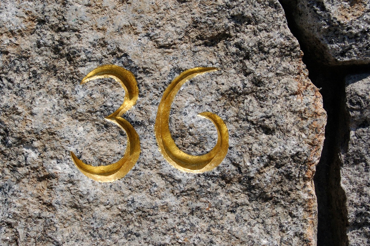 hand carved numbers with 24K gold leaf